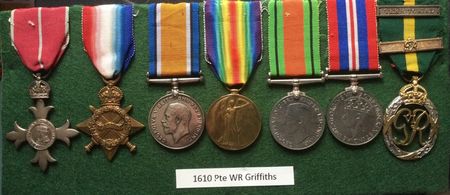 An MBE of the Military Division (identifiable by the central grey stripe in the ribbon), first and second World War medals and the Territorial Decoration with second award bar.