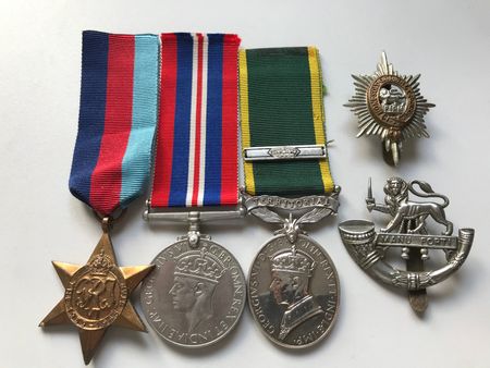 Bert Poole's Second World War Medals along with his Efficiency Medal and clasp. He served with the 8th Worcestershire Regiment during the Battle of France and was taken prisoner before the fall of Dunkirk.