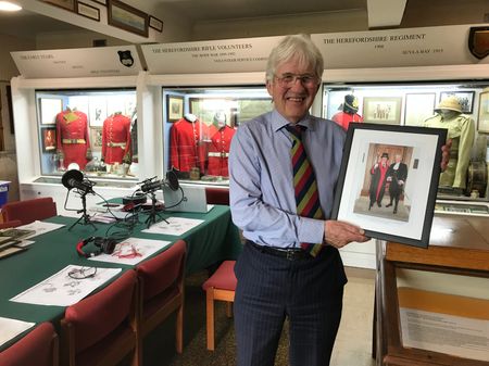 Mr Bill Jackson in the museum holding a picture of him as High Sheriff and his former platoon sergeant, Mick Meredith as Sergeant-at-Arms of Leominster Town Council. On parade again after nearly 50 years.