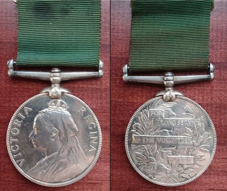 The Volunteer Force Long Service medal awarded for 20 years service with the Volunteers. Two such medals mysteriously exist for Pte George Greenhouse of Leominster.