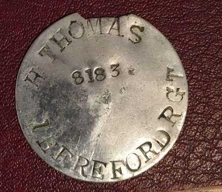 Privately made WW1 ID Disc of 8183 Pte H Thomas Herefordshire Regiment.