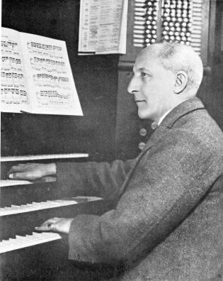 Percy Hill at the console of the Fr Willis organ in Hereford Cathedral