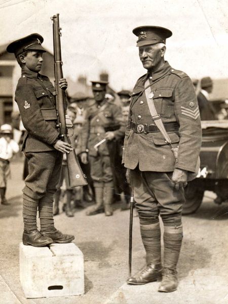 The youngest and oldest soldiers in the Regiment - both Bethells. Bandsman Bethell's rifle is nearly as tall as he is.