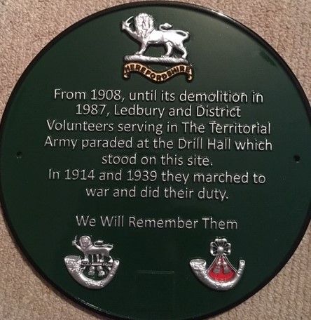 A plaque obn the Coop wall now commemorates the old Drill hall site and those that served there.