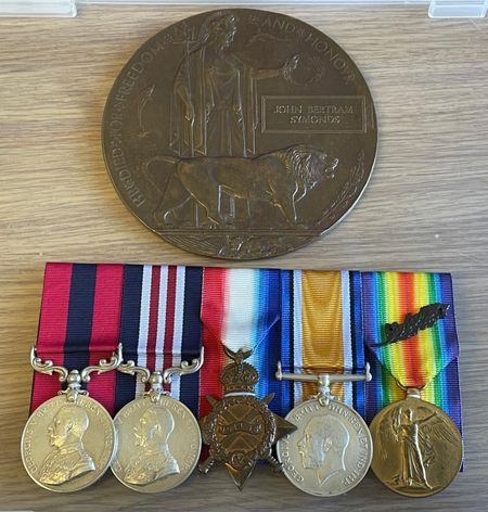 The Memorial Plaque and Medals awarded to the NoK of 235989 LSgt John Bertram Symonds; Killed in Action 23rd July 1918. LSgt Symonds is the Herefordshire Regiment’s most decorated soldier being awarded the Distinguished Conduct Medal (DCM), The Military Medal (MM) and the Mention in Dispatches (MID).