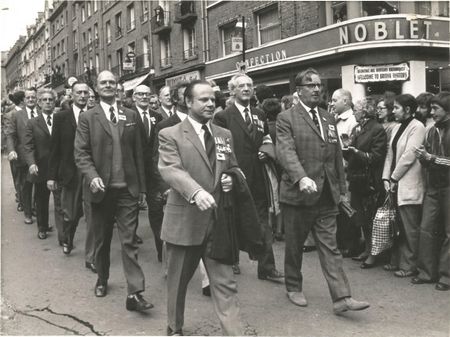 Ken at the head of a group of Veterans