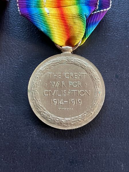 The reverse of the Victory Medal. A medal issued to all British and Commonwealth troops who served overseas on the establishment of a unit. Over 2000 were issued to men of the Herefordshire Regiment.